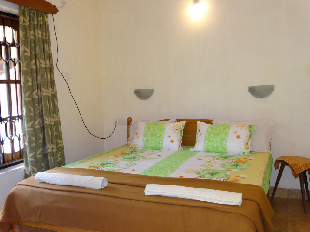 Pinto Guest House Candolim Quarto foto