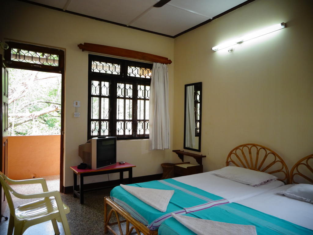 Pinto Guest House Candolim Quarto foto